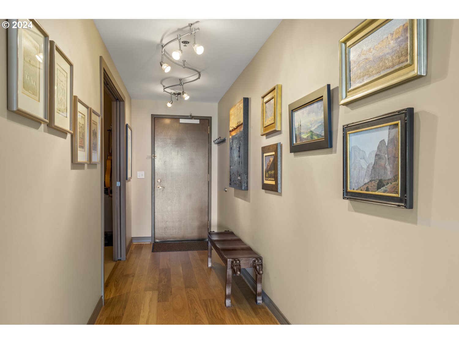 2454 Northwest Westover Road, Unit 405 Portland, OR 97210 - Photo 27 of 37 a bathroom with a sink mirror and a shower
