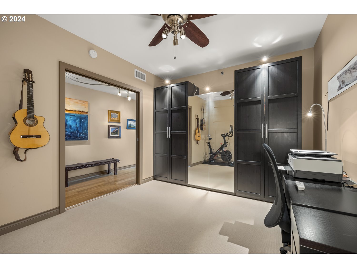 2454 Northwest Westover Road, Unit 405 Portland, OR 97210 - Photo 28 of 37 a view of a livingroom with furniture and a ceiling fan