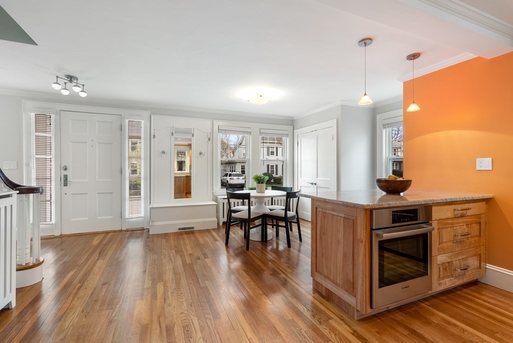 54 Merrill Road Watertown, MA 02472 - Photo 11 of 36 a view of kitchen with sink and wooden floor