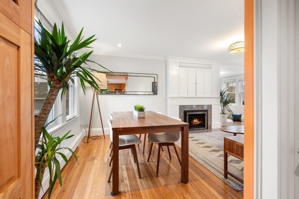 54 Merrill Road Watertown, MA 02472 - Photo 18 of 36 a view of a livingroom with furniture and a fireplace
