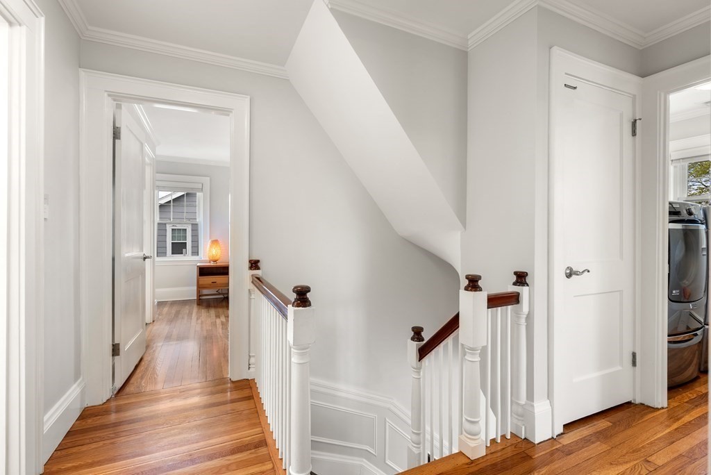 54 Merrill Road Watertown, MA 02472 - Photo 20 of 36 a view of a hallway with a wooden floor and entryway