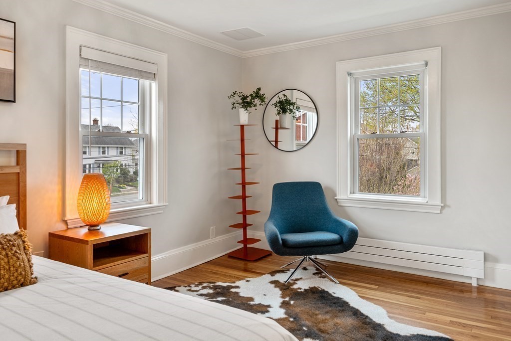 54 Merrill Road Watertown, MA 02472 - Photo 22 of 36 a living room with furniture and a window