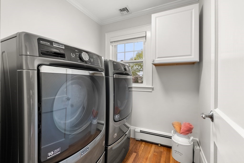 54 Merrill Road Watertown, MA 02472 - Photo 31 of 36 a utility room with dryer and washer