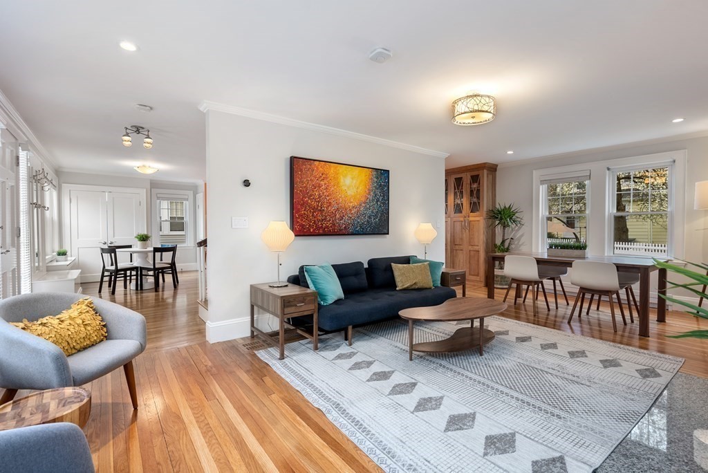 54 Merrill Road Watertown, MA 02472 - Photo 4 of 36 a living room with furniture and a flat screen tv