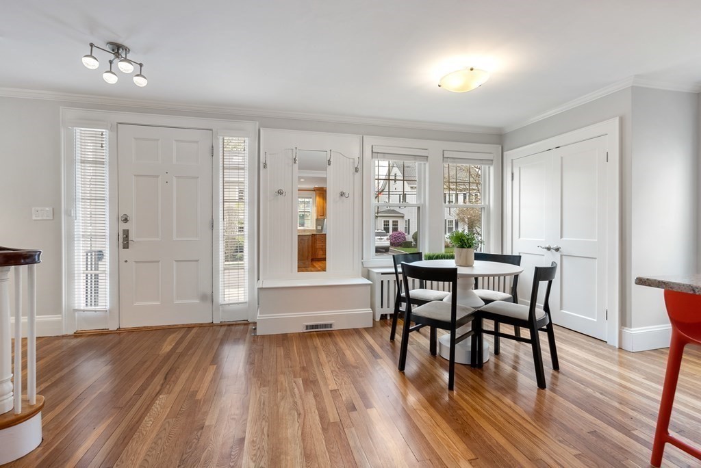 54 Merrill Road Watertown, MA 02472 - Photo 10 of 36 a view of a dining room with furniture and wooden floor