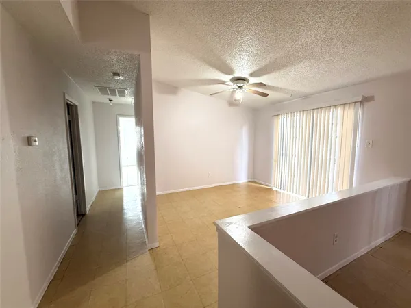 a view of an empty room with window
