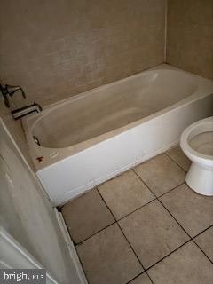 3107 Naylor Road Southeast, Unit 203 Washington, DC 20020 - Photo 21 of 29 a bathroom with a bathtub and toilet