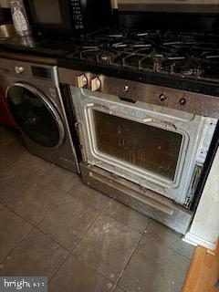 3107 Naylor Road Southeast, Unit 203 Washington, DC 20020 - Photo 24 of 29 a close up view of a washer and dryer