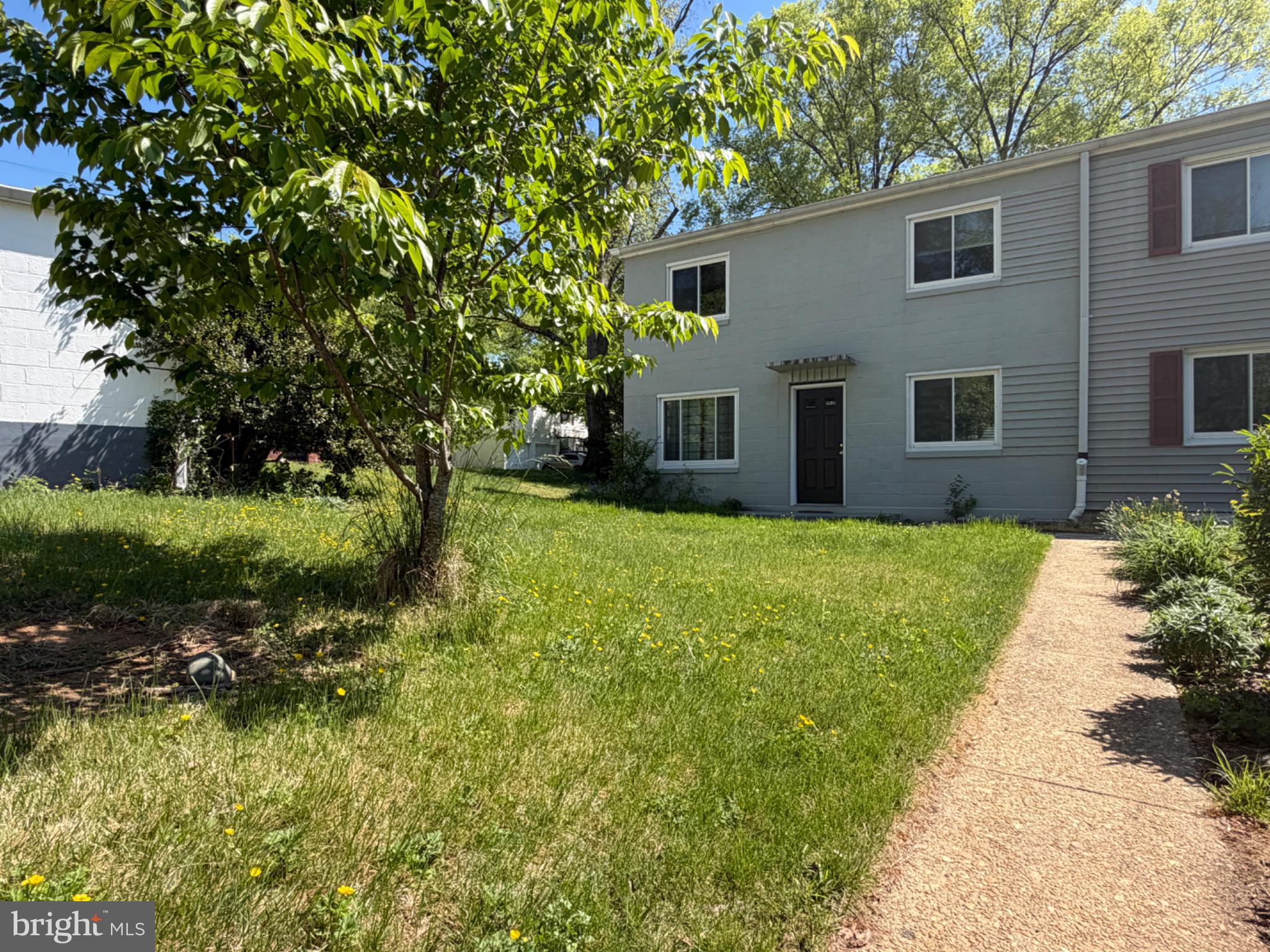 29 B Ridge Road Greenbelt, MD 20770 - Photo 14 of 17 Charming home with lush greenery.