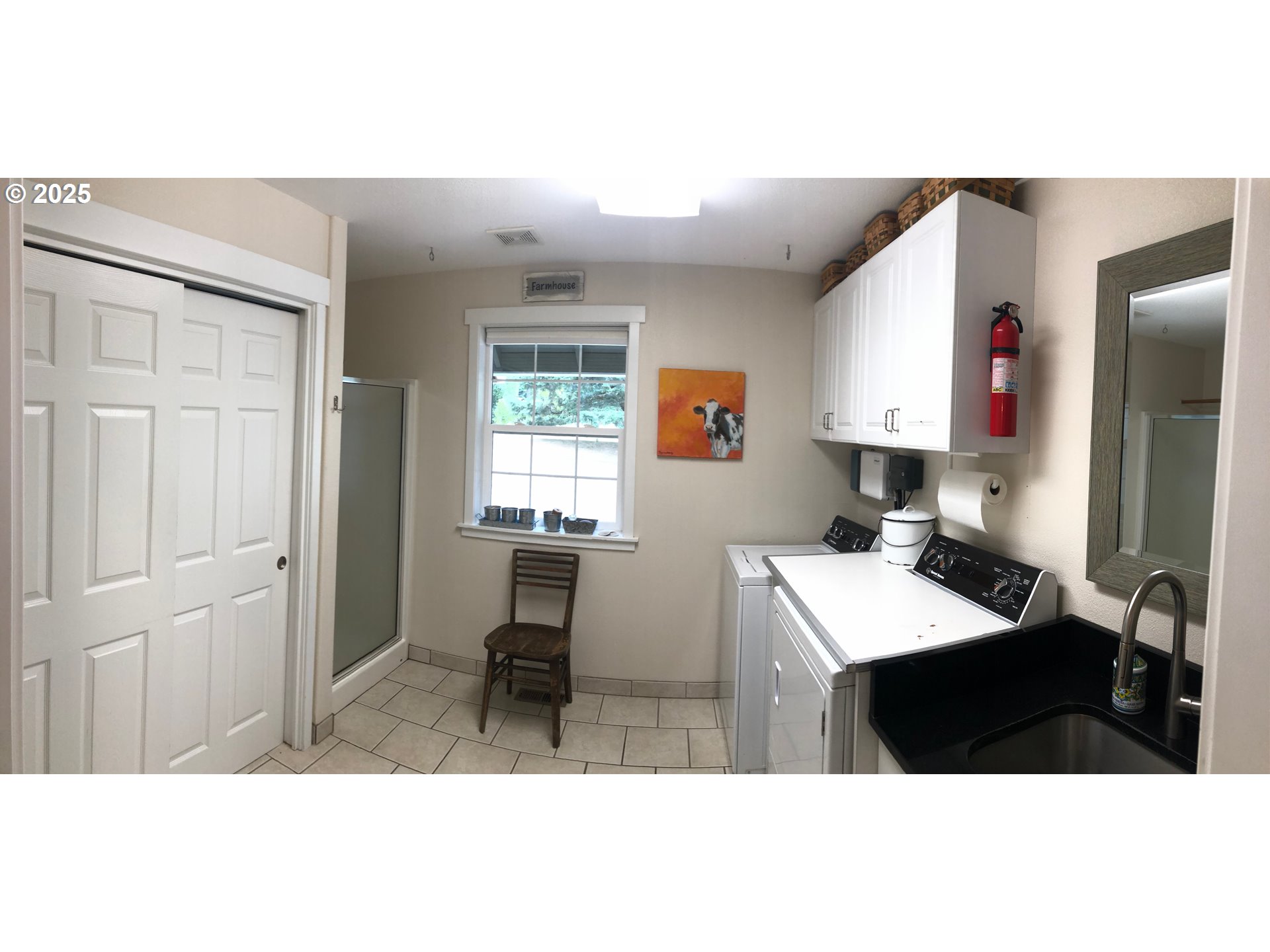 62941 Northwest Cochran Road Timber, OR 97144 - Photo 11 of 44 a kitchen with a sink cabinets and a window