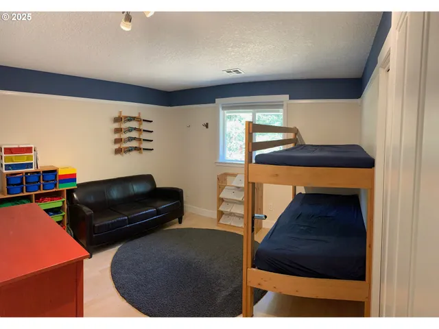 a kitchen with furniture and window
