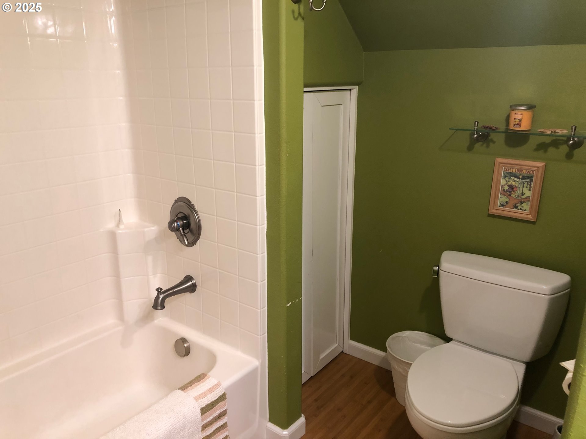 62941 Northwest Cochran Road Timber, OR 97144 - Photo 24 of 44 a white toilet sitting next to a bath tub