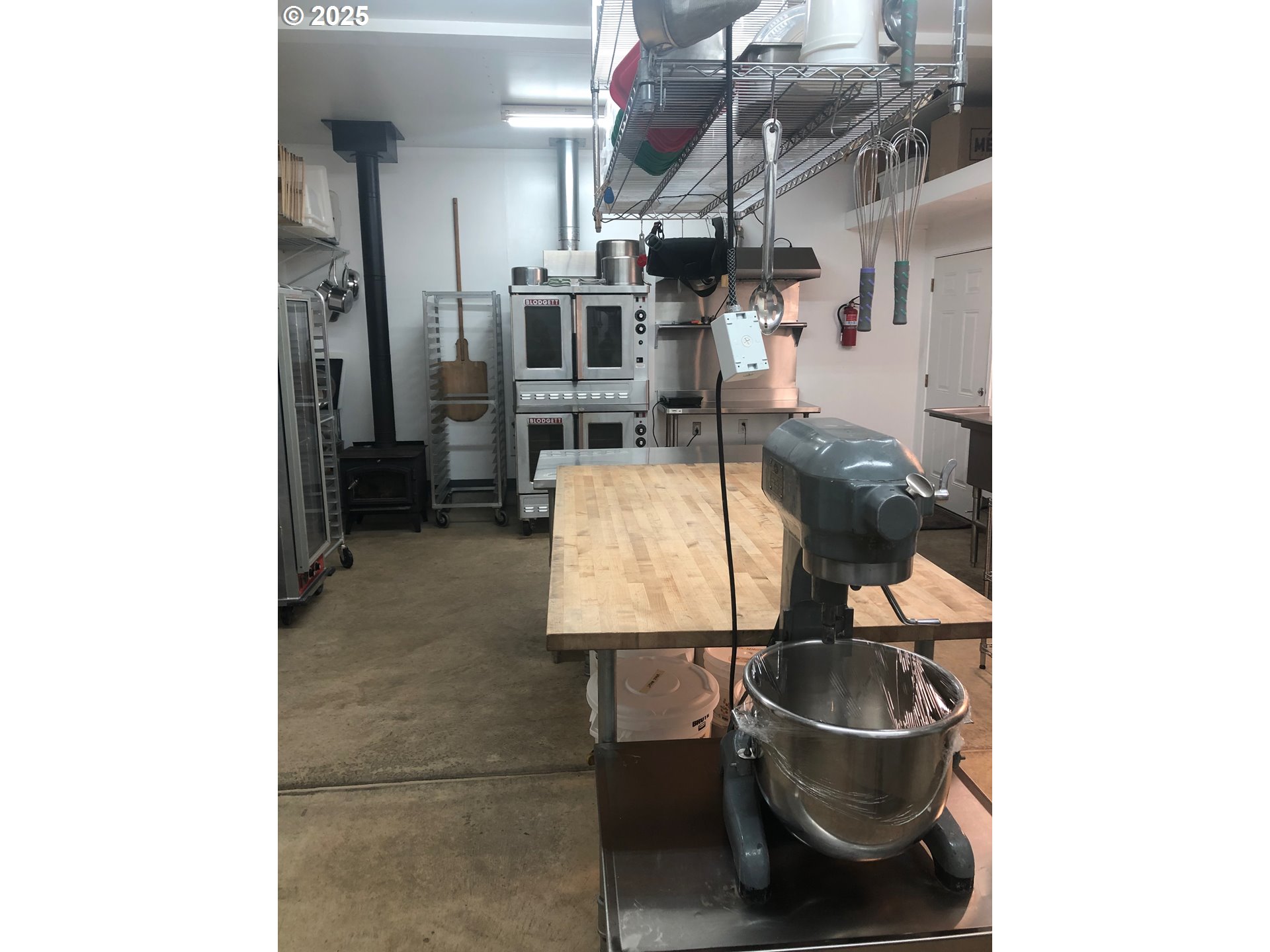 62941 Northwest Cochran Road Timber, OR 97144 - Photo 27 of 44 a living room with furniture and a wooden floor