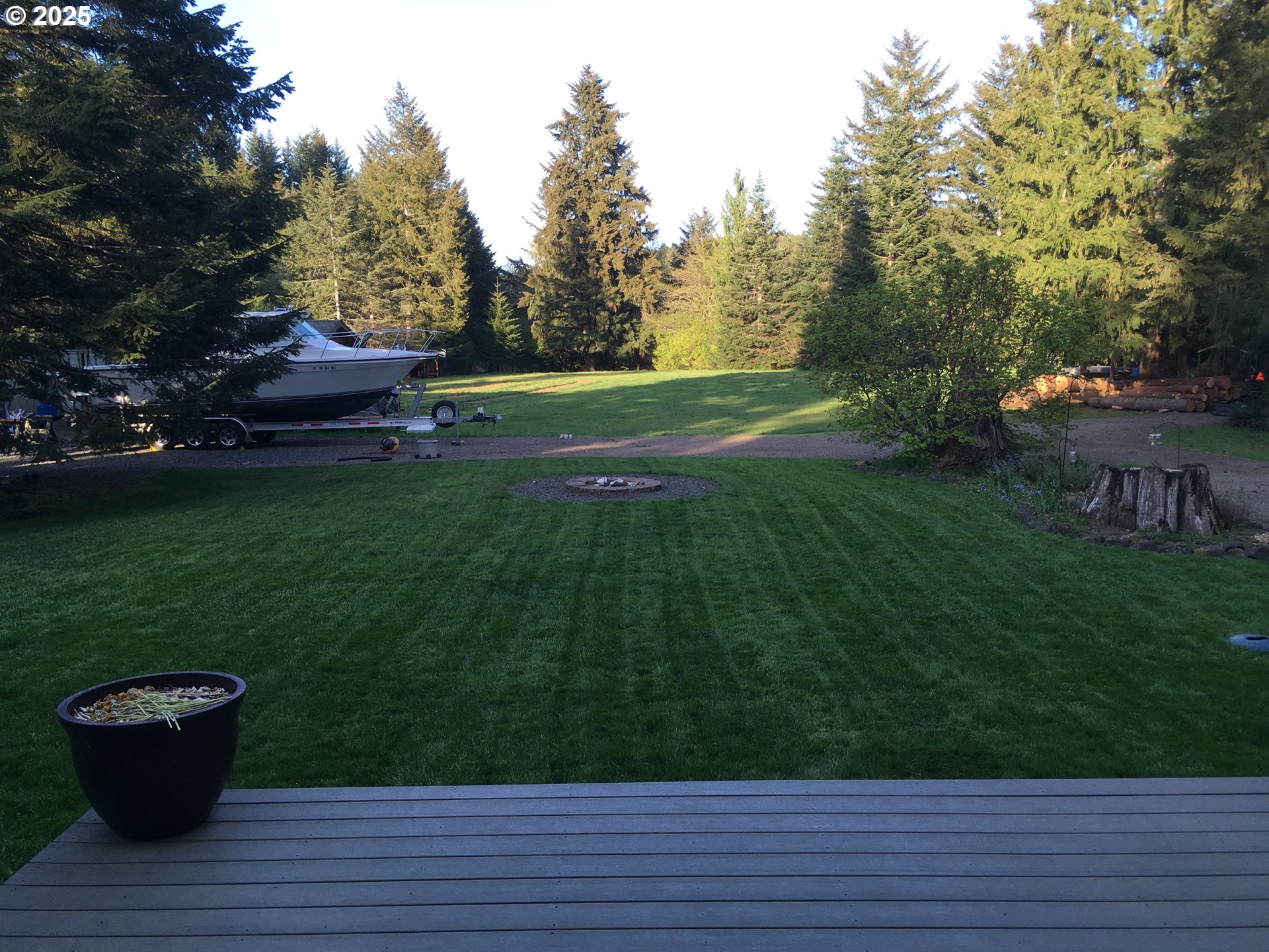 62941 Northwest Cochran Road Timber, OR 97144 - Photo 34 of 44 a view of a terrace with a garden