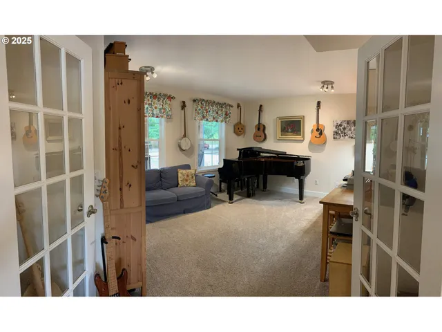 a kitchen with a sink cabinets and a window