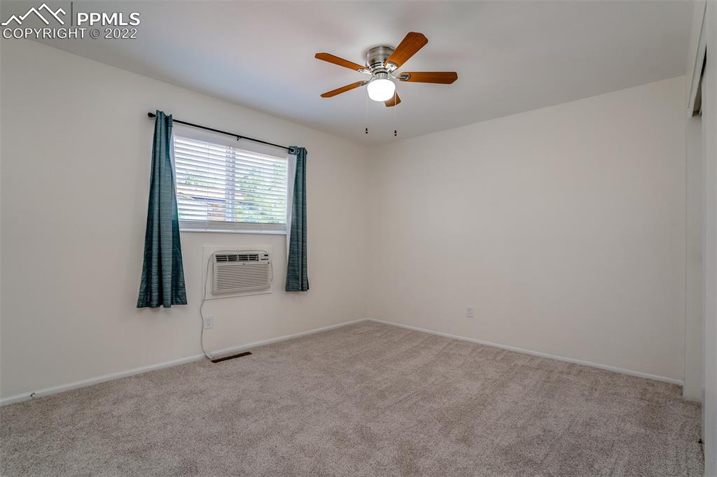 2515 Monterey Road Colorado Springs, CO 80910 - Photo 15 of 32 an empty room with a window