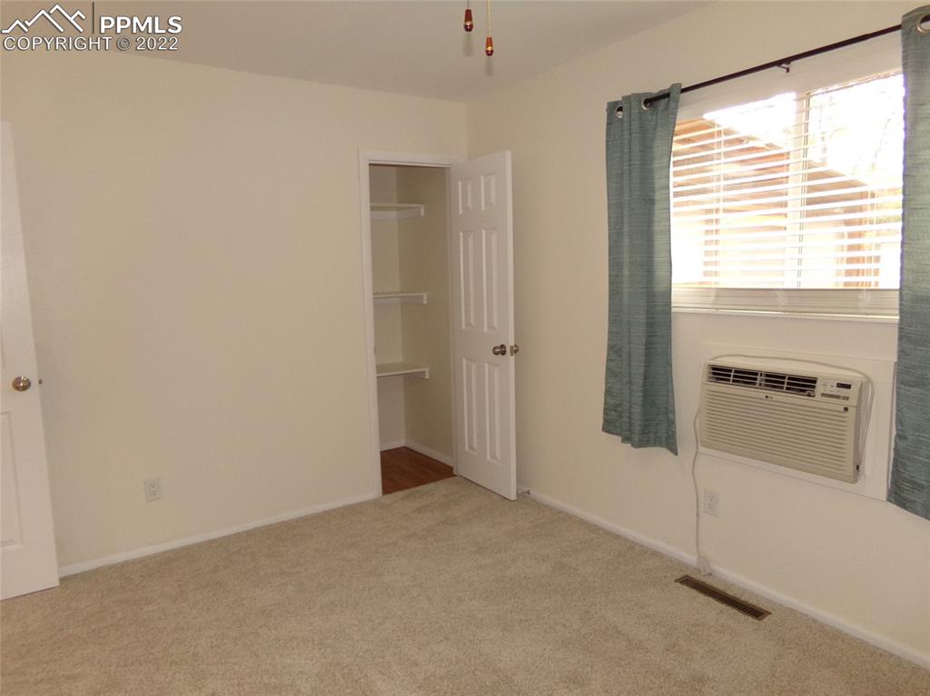 2515 Monterey Road Colorado Springs, CO 80910 - Photo 30 of 32 a view of an empty room with a window