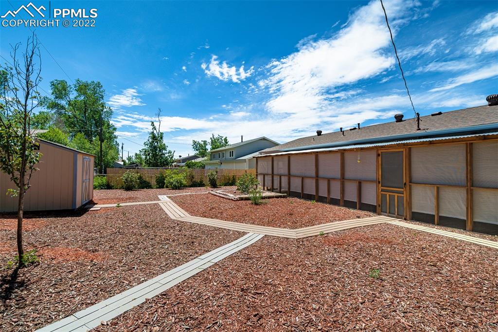 2515 Monterey Road Colorado Springs, CO 80910 - Photo 4 of 32 a view of a backyard of the house