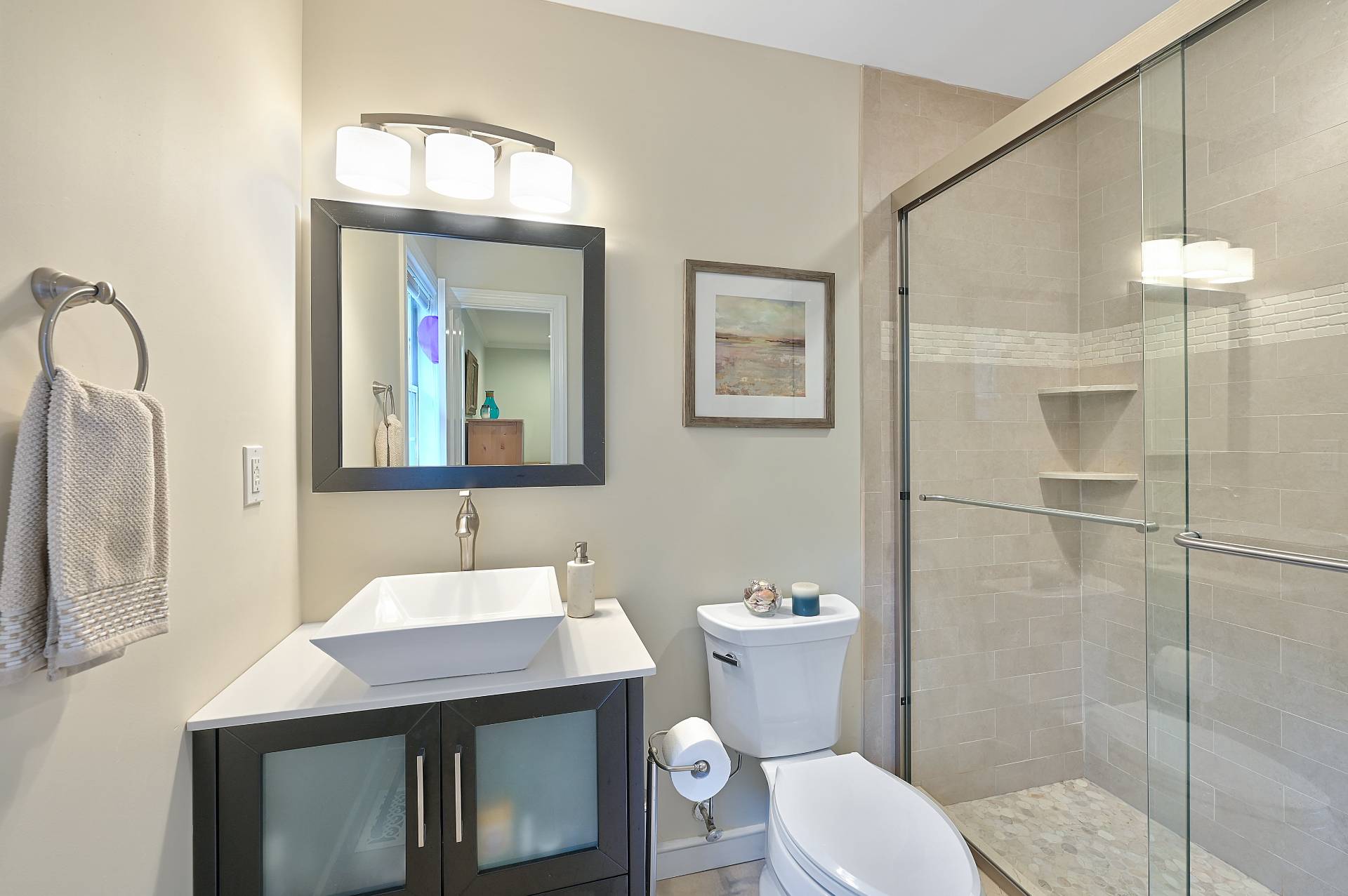 25 Nidzyn Avenue Remsenburg, NY 11960 - Photo 14 of 32 a bathroom with a sink toilet and shower