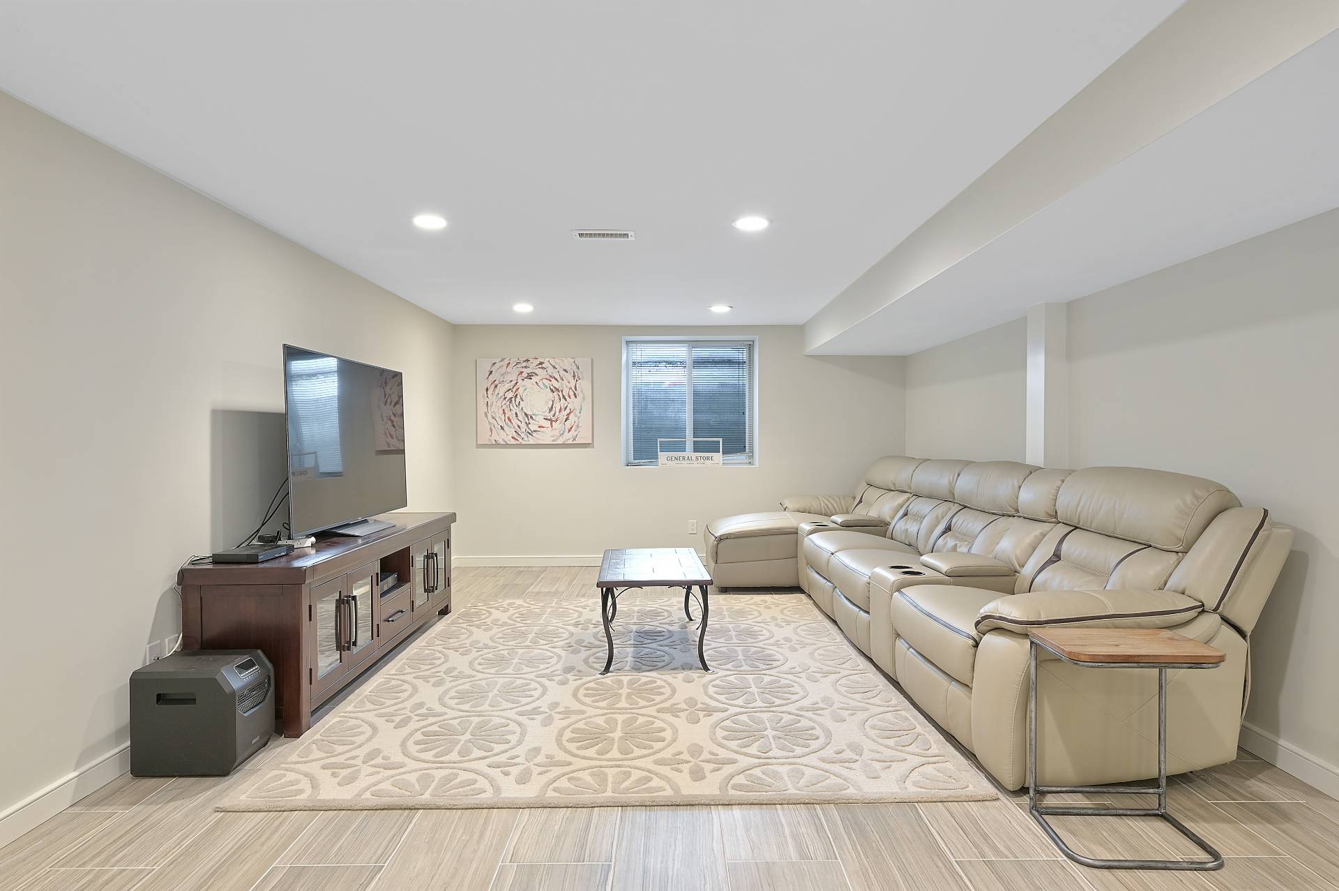 25 Nidzyn Avenue Remsenburg, NY 11960 - Photo 20 of 32 a living room with furniture and a flat screen tv