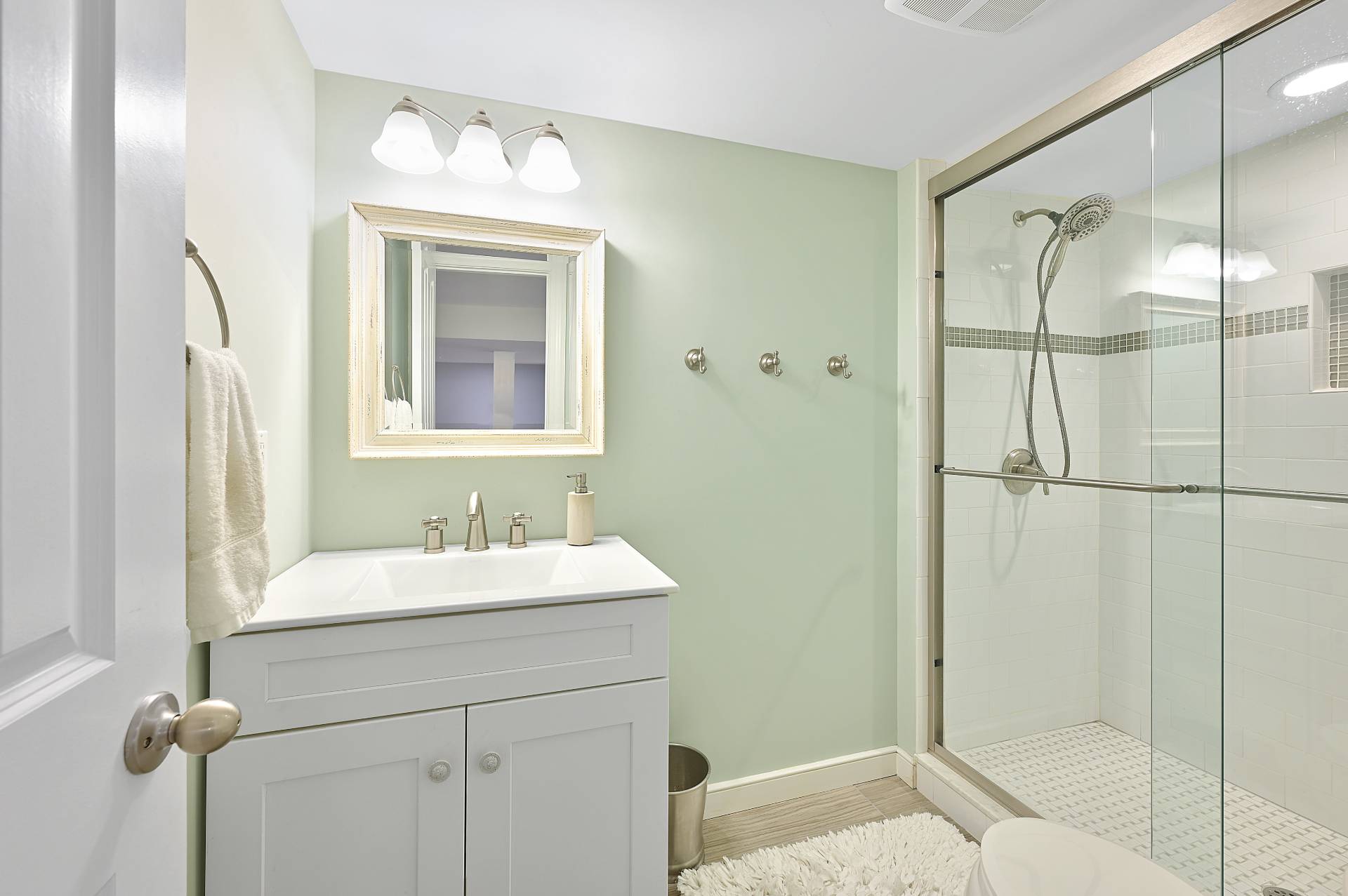 25 Nidzyn Avenue Remsenburg, NY 11960 - Photo 23 of 32 a bathroom with a sink and a mirror