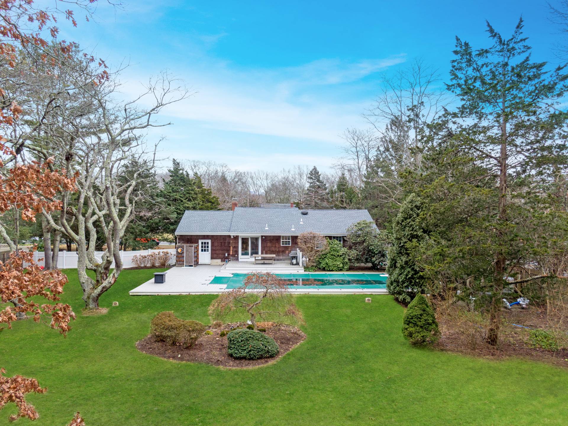 25 Nidzyn Avenue Remsenburg, NY 11960 - Photo 25 of 32 a view of a house with a big yard
