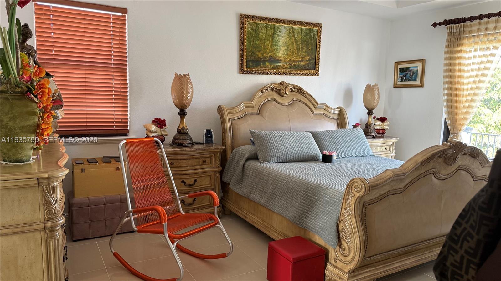 14431 Southwest 22nd Terrace Miami, FL 33175 - Photo 10 of 17 a bed room with a bed and a chair