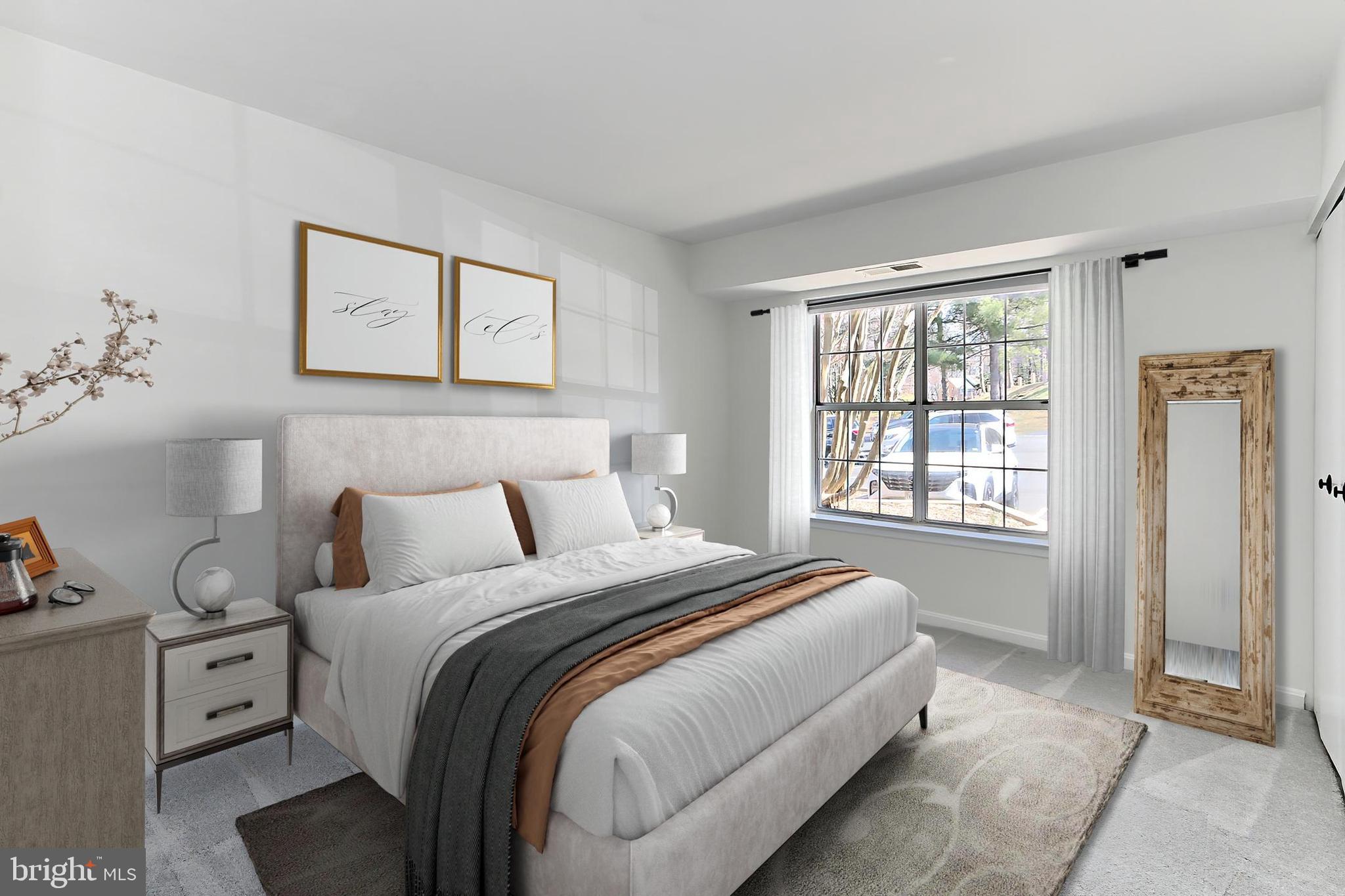 5912 Cove Landing Road, Unit 204 Burke, VA 22015 - Photo 21 of 42 a bedroom with a bed and a window