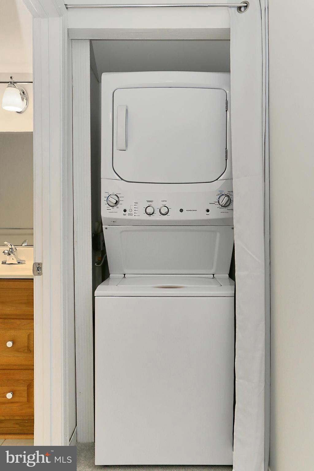 5912 Cove Landing Road, Unit 204 Burke, VA 22015 - Photo 27 of 42 a utility room with dryer and washer