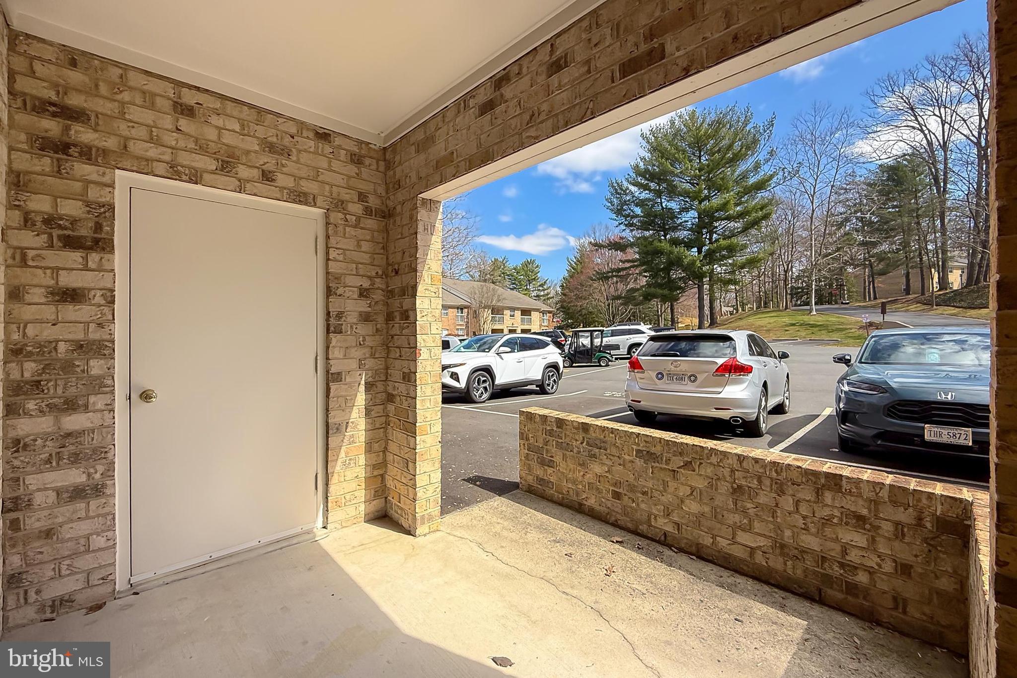 5912 Cove Landing Road, Unit 204 Burke, VA 22015 - Photo 29 of 42 a view of car parked on the side of the road