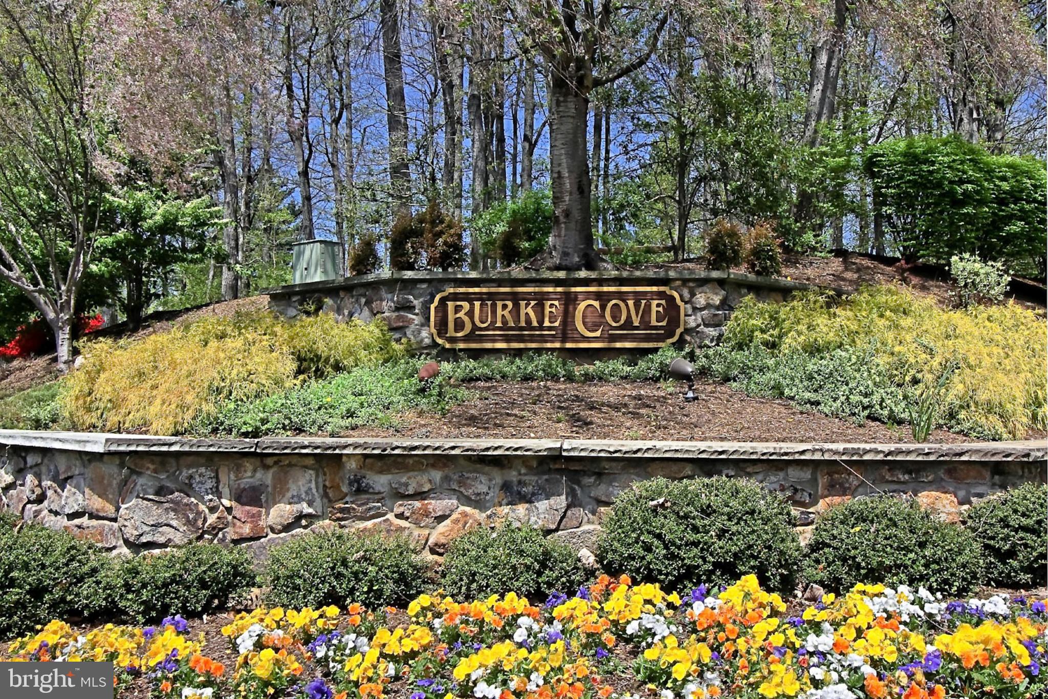 5912 Cove Landing Road, Unit 204 Burke, VA 22015 - Photo 42 of 42 a view of a sign board with wooden fence