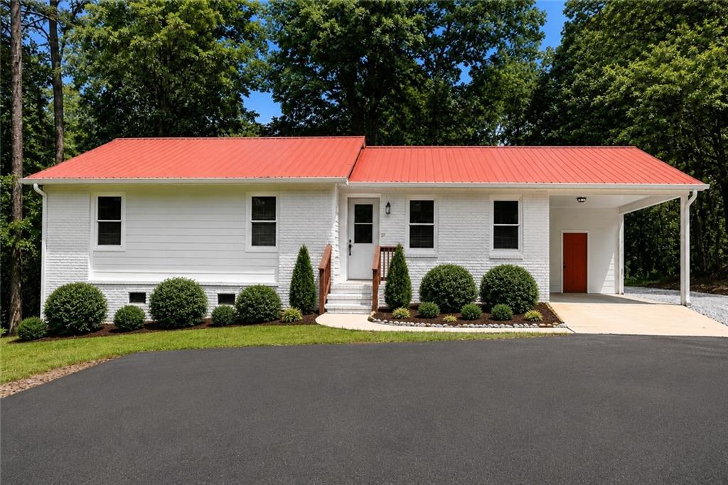 26 Ridgeview Court Dahlonega, GA 30533 - Photo 1 of 23 a front view of a house with a yard