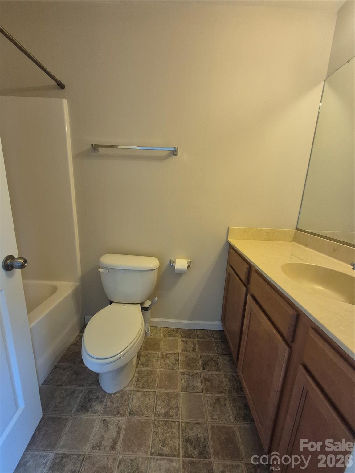 149 Alpine Ridge Drive Asheville, NC 28803 - Photo 11 of 15 a bathroom with a sink a toilet and a shower