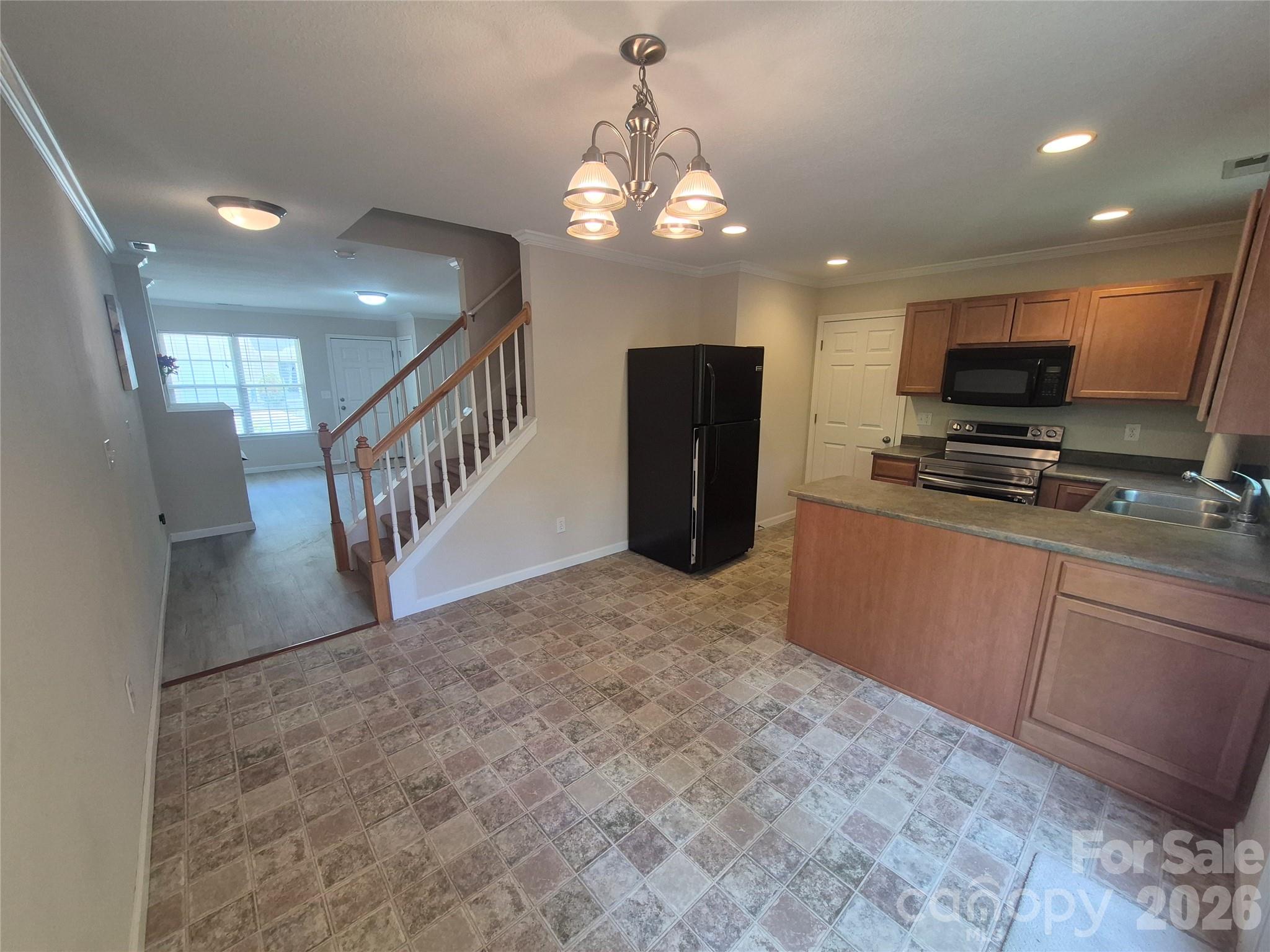 149 Alpine Ridge Drive Asheville, NC 28803 - Photo 7 of 15 a view of entryway and kitchen