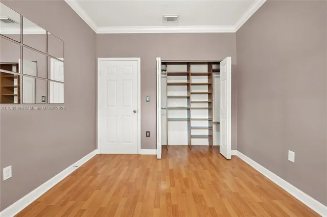 a view of a house with swimming pool having outdoor seating