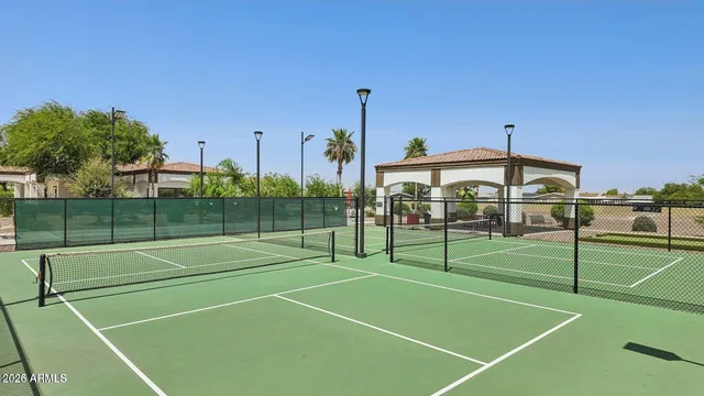 a view of tennis court with basket ball court