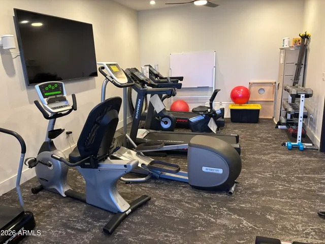 a room with furniture and air hockey table