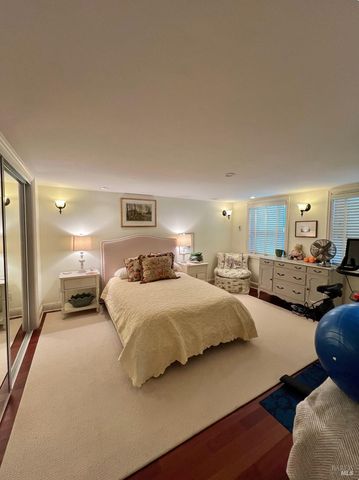 a view of a patio with couches and potted plants