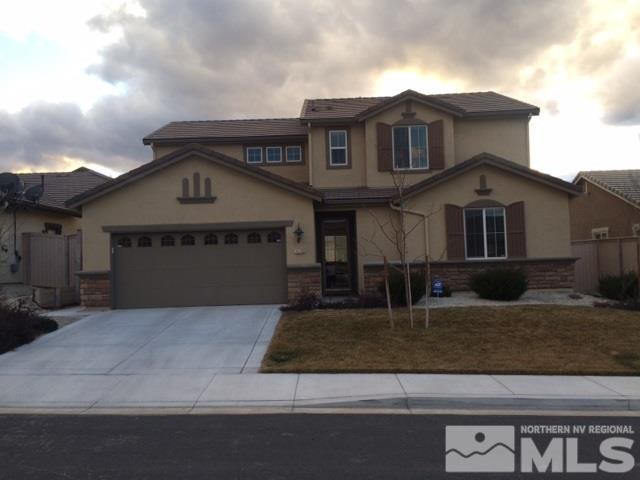 10765 Cedar Rock Drive Reno, NV 89521 - Photo 1 of 1 a front view of a house with garden