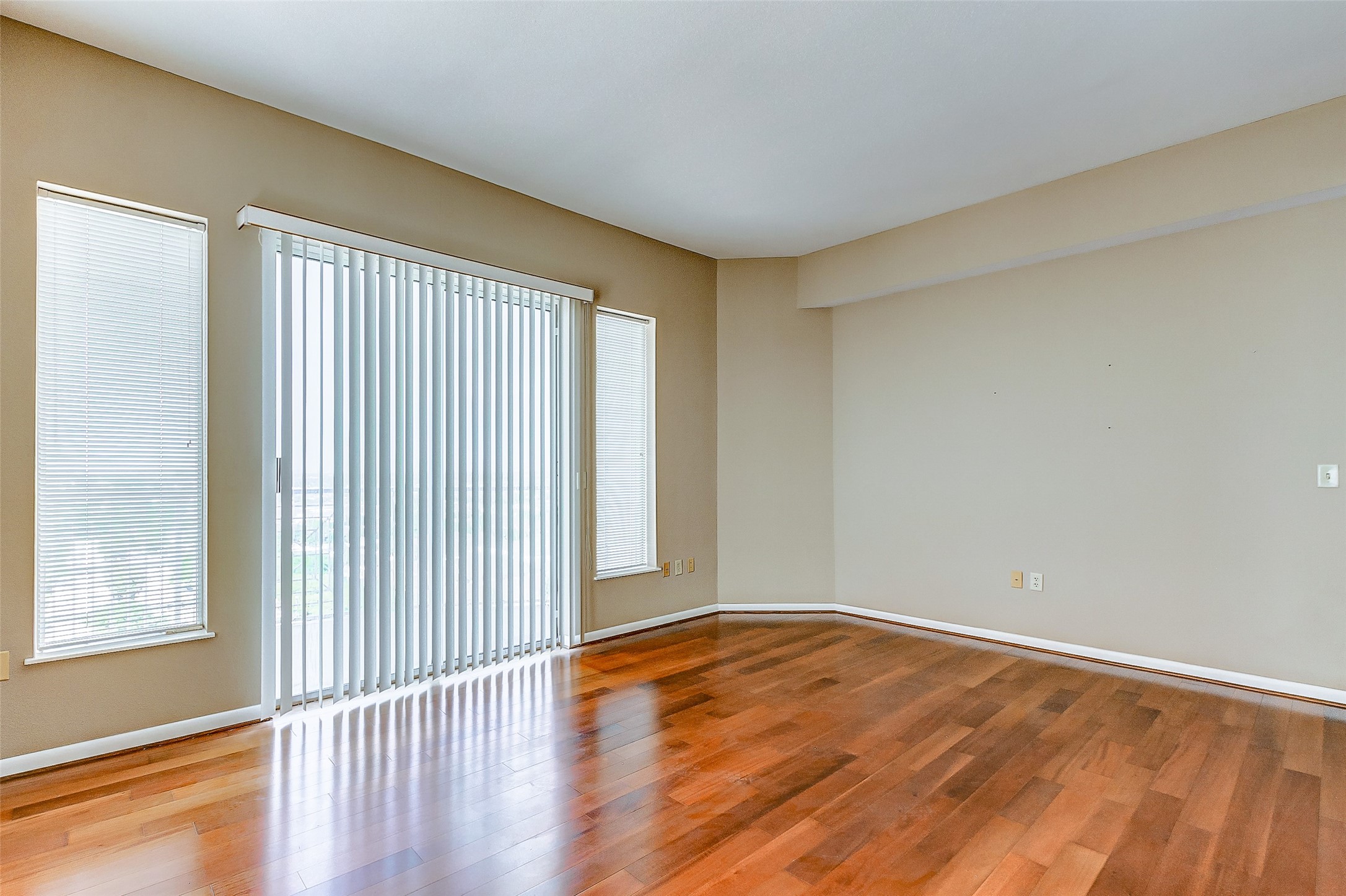 3505 Sage Road, Unit 1702 Houston, TX 77056 - Photo 16 of 23 a view of empty room with wooden floor and fan