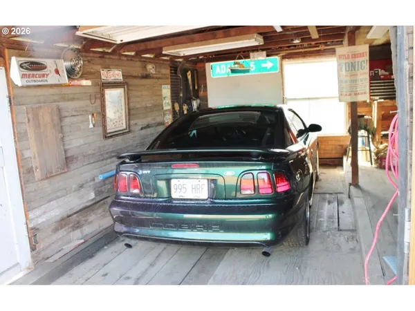 a black and white photo of a living room