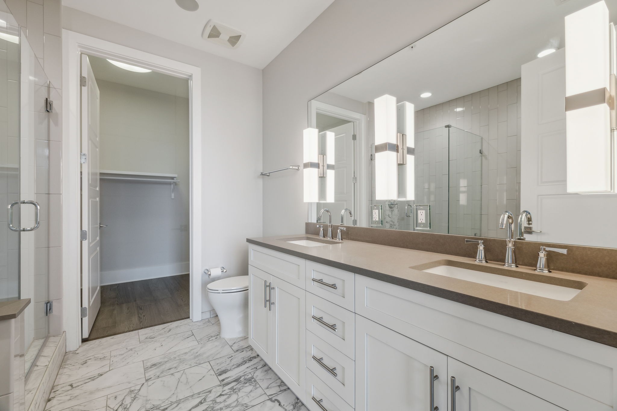 20 Rutledge Street, Unit 605 Nashville, TN 37210 - Photo 16 of 63 Primary bathroom has lots of room to spread out and double vanities.