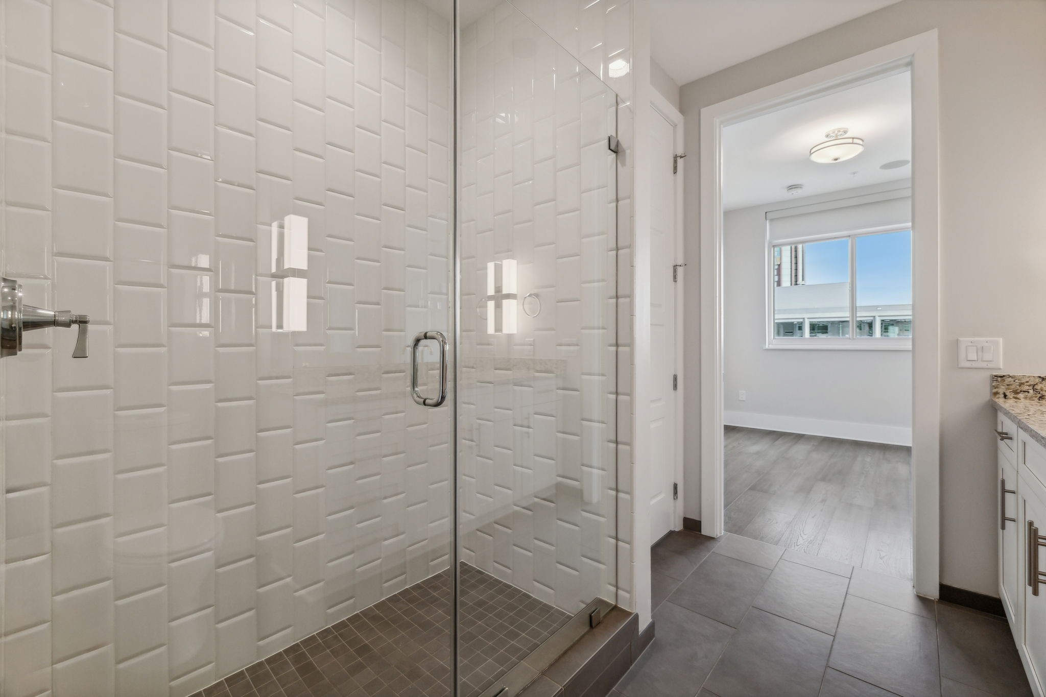 20 Rutledge Street, Unit 605 Nashville, TN 37210 - Photo 25 of 63 The modern shower in the guest bath is huge.