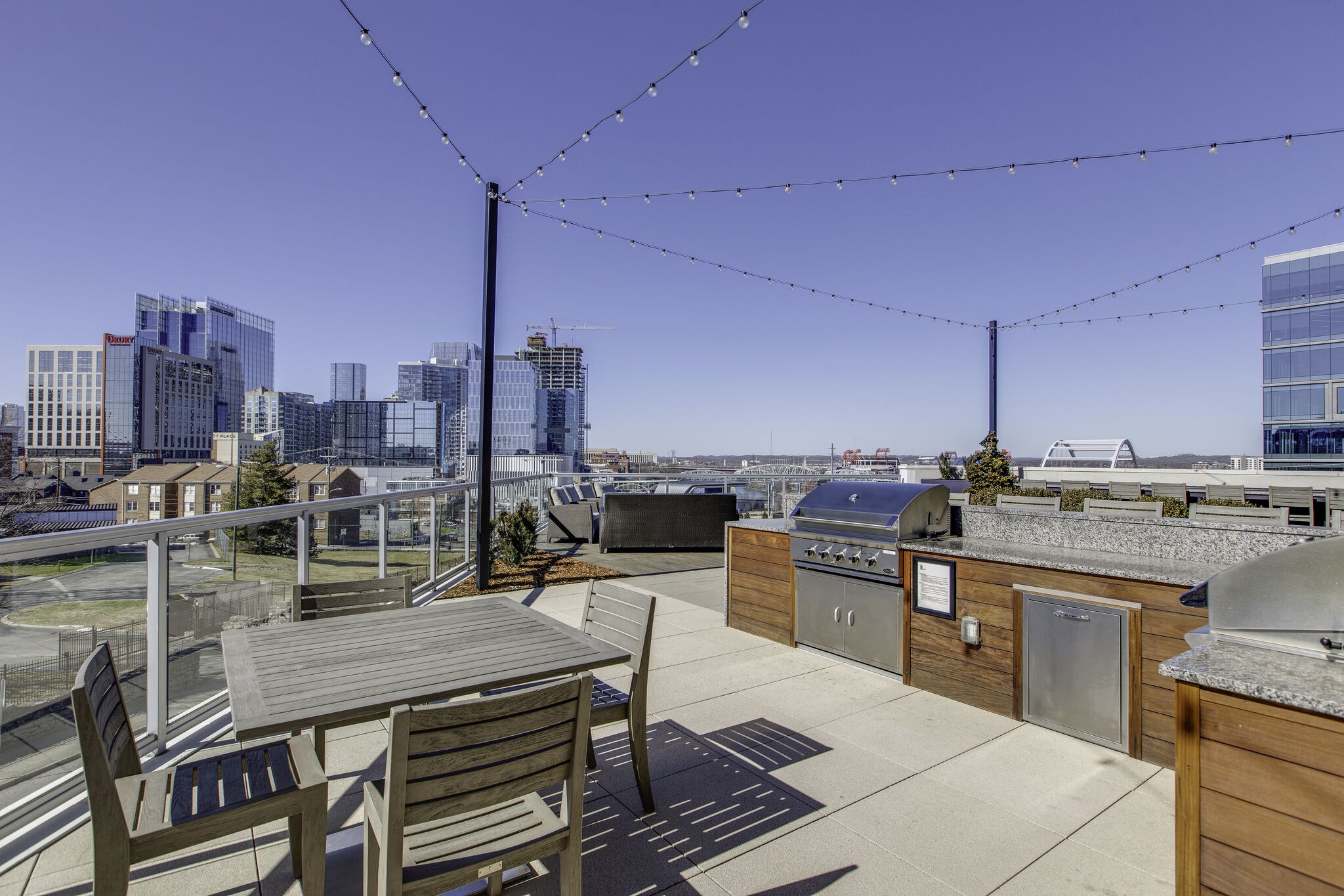 20 Rutledge Street, Unit 605 Nashville, TN 37210 - Photo 47 of 63 The first floor deck has 2 grills and a gas firepit. Not to mention the views!