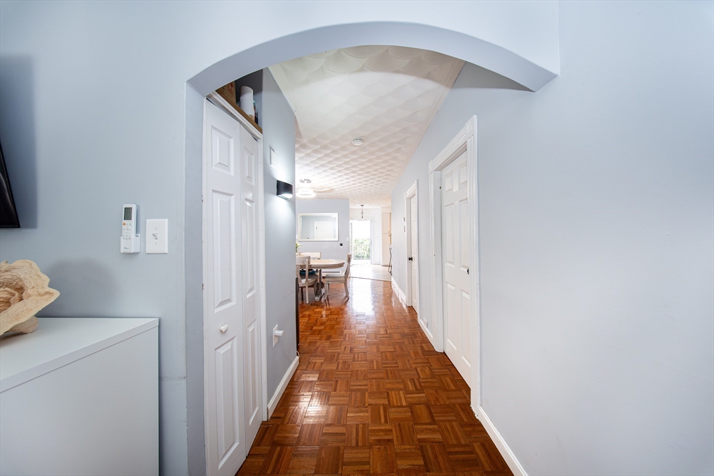 166 Bradford Avenue Fall River, MA 02721 - Photo 15 of 42 a view of a hallway with a furniture