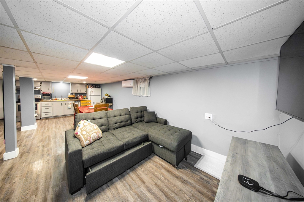 166 Bradford Avenue Fall River, MA 02721 - Photo 20 of 42 a living room with furniture and a couch