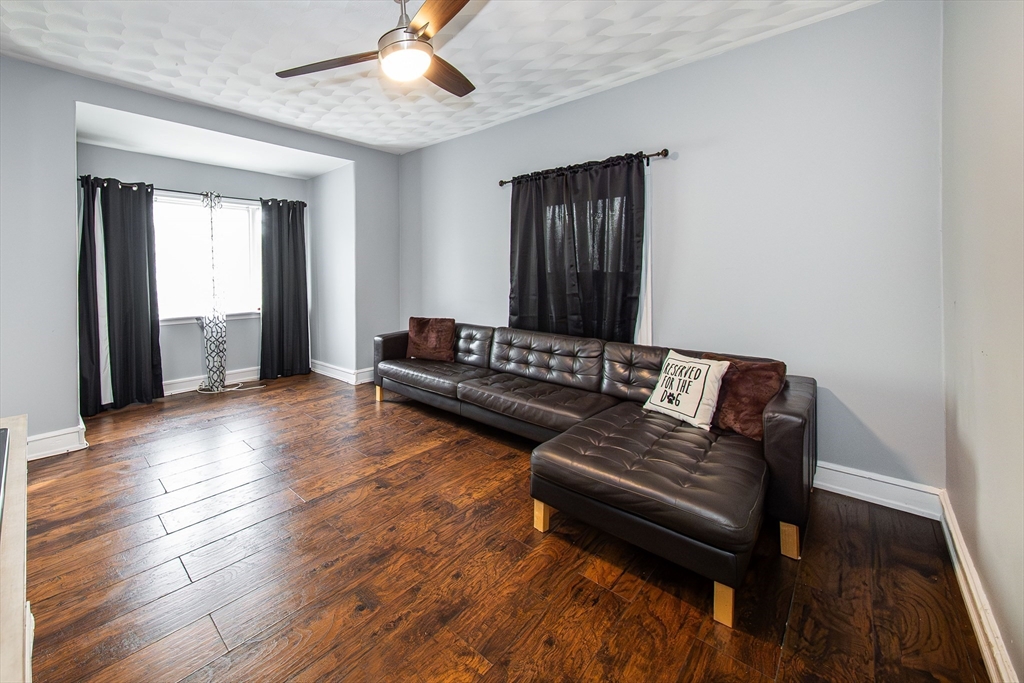 166 Bradford Avenue Fall River, MA 02721 - Photo 26 of 42 a view of a livingroom with furniture and wooden floor