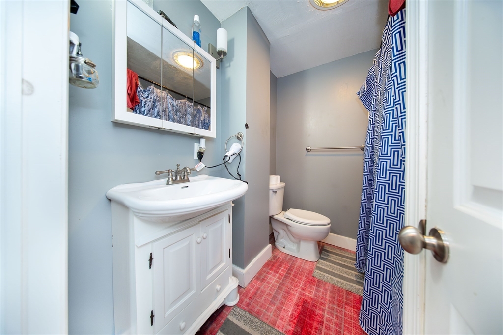 166 Bradford Avenue Fall River, MA 02721 - Photo 33 of 42 a bathroom with a sink toilet and shower