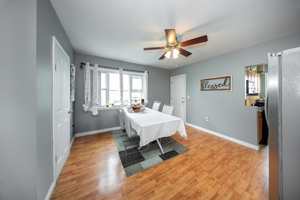 166 Bradford Avenue Fall River, MA 02721 - Photo 37 of 42 a living room with a bed furniture and a window