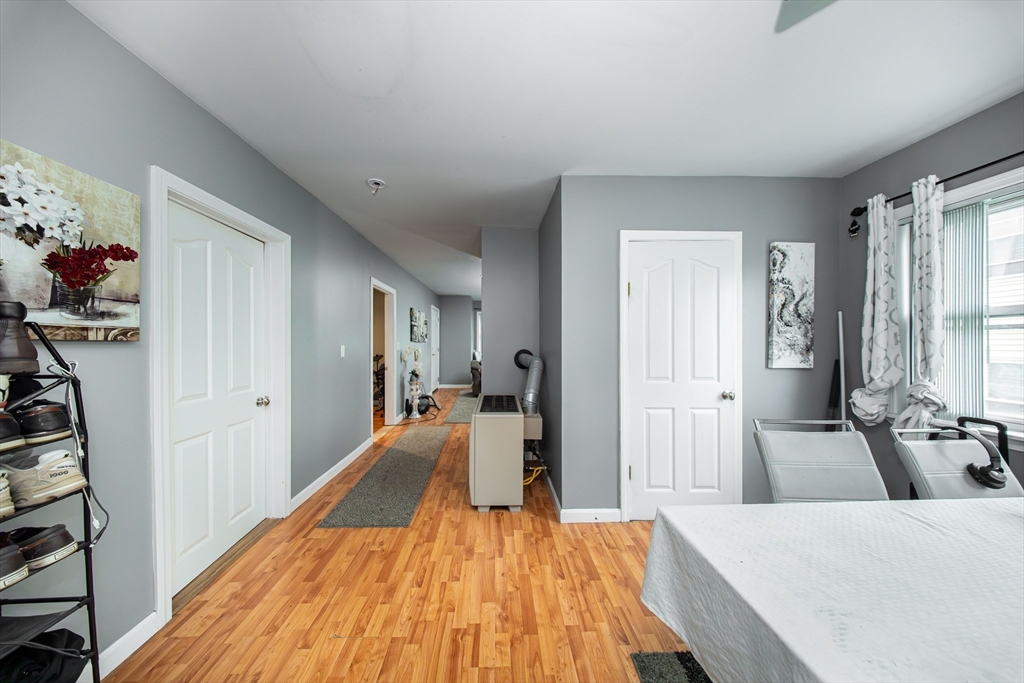 166 Bradford Avenue Fall River, MA 02721 - Photo 39 of 42 a bed room with a bed and a couch